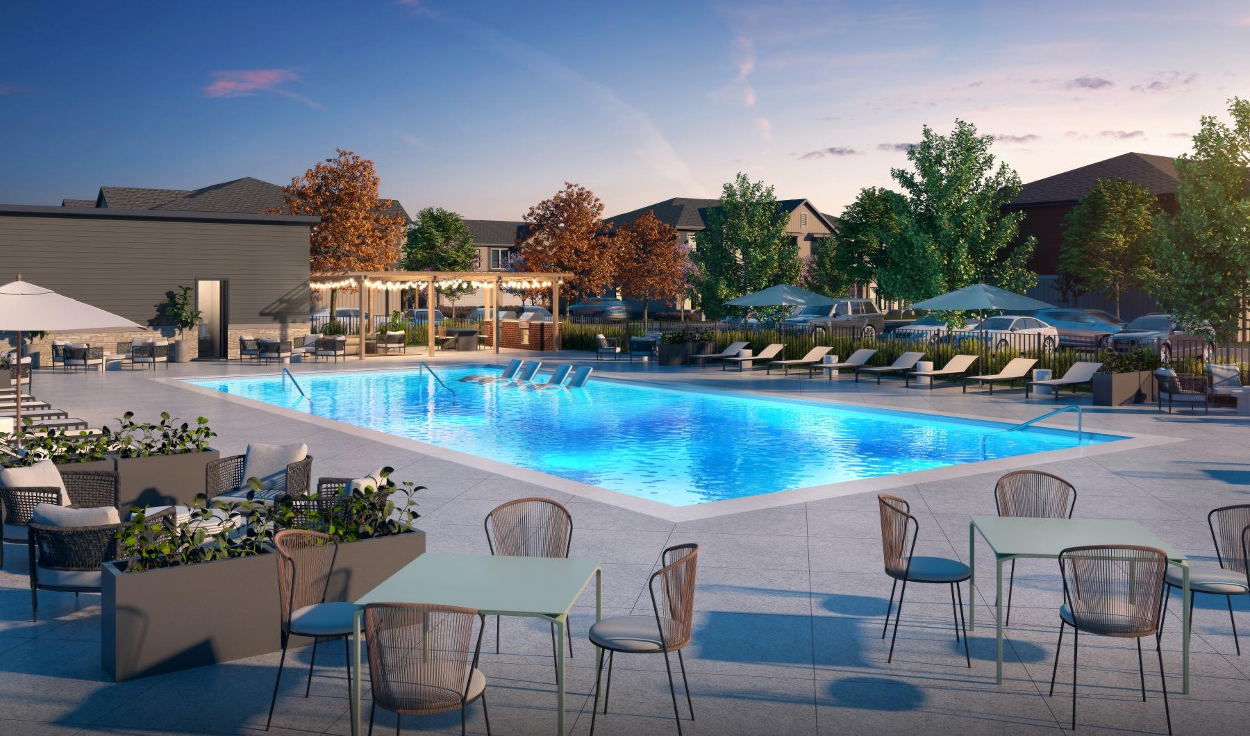 a pool with chairs around it